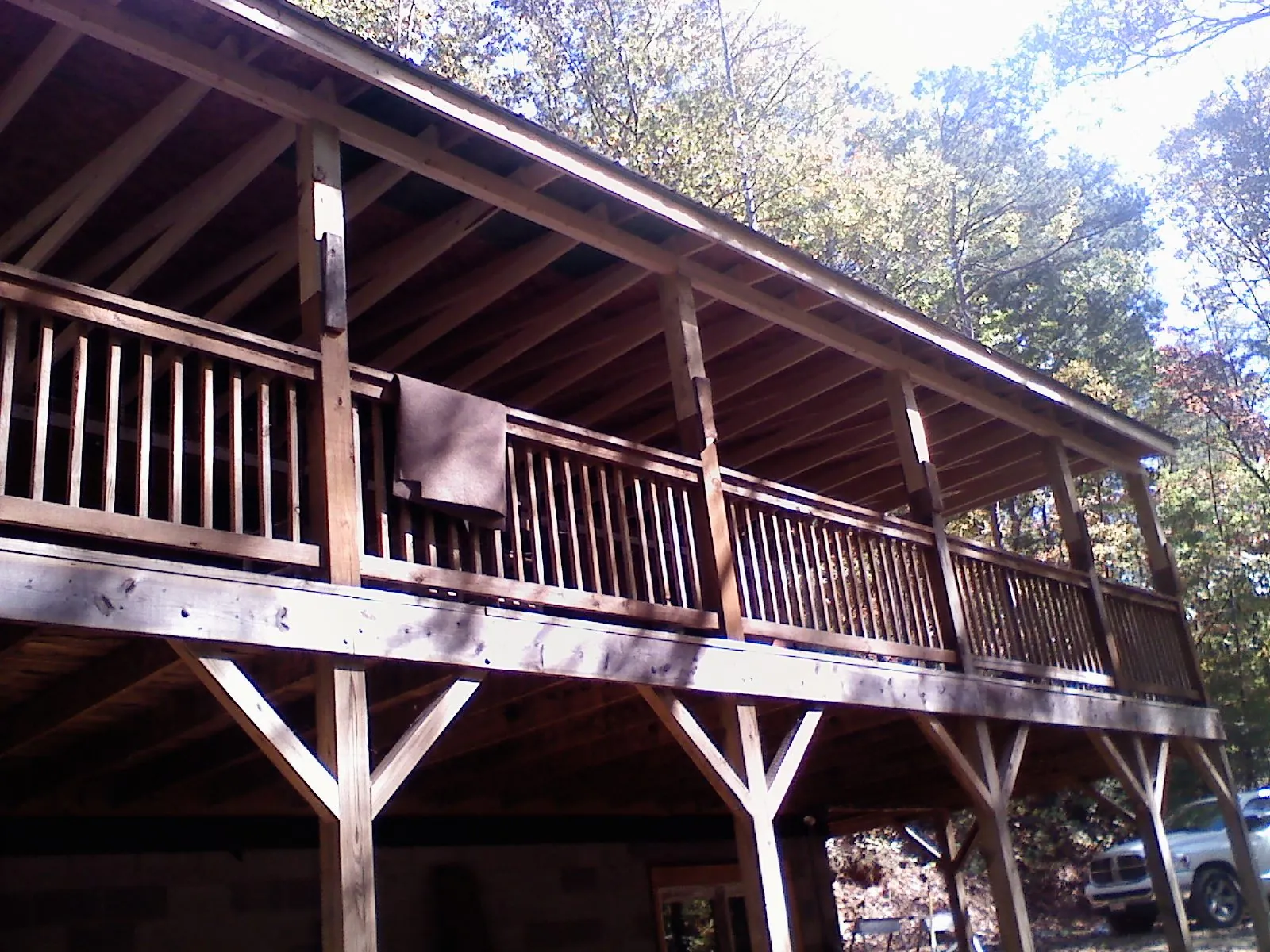 Timber framing under a new elevated porch and deck — Roof Leak Repair in Cornwall by Roofing Brothers